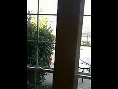 BBC masturbates in front of window at bikini hottie!