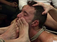Get a load of this gay bondage scene where this guy is fucked by fellas after being tortured and humiliated.