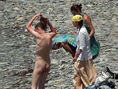 His hidden cam reveals great views with nude babes from the beach