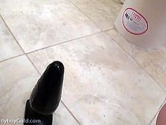 Water spray enema and buttplug for sexy Ladyboy Donut. Donut sits on the toilet backwards and spreads her buns. Gaze at her puckered hole while clean water shoots out her pretty hole.