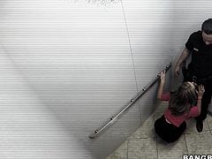 She is a kinky and horny girl and she will suck anyone's cock - including the cock of the security officer in her building. She undoes his pants and pulls out his cock and sucks him off right then and there in the elevator.