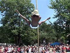 Check out this outdoor pole dancing contest with a bunch of fuckin' dirty-ass tramps doing their best to win. Check it out!
