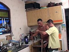 A handsome Latin dude repairs something in a kitchen. After some time an owner of a house gives a blowjob to the plumber. Then he lies down on a kitchen table and gets ass fucked.