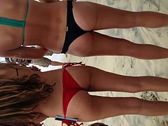 3 teen thongs on beach