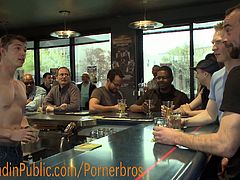 Well hung gay guy is bound in public in this raw scene of bdsm gay sex. Horny studs fuck his mouth and asshole, torture him and what not, a must see!