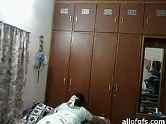 Dark haired babe with nice body rides a cock of her husband on the bed. Have a look at this chick in The Indian Porn sex video.