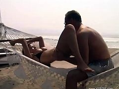 This fucker eats this bitch's pussy out at the beach and then they fuck hard, check it out right here! It's hot as fuck!