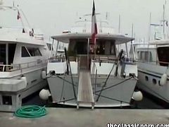 The Classic Porn brings you an exciting free porn video where you can see how a vintage brunette gets nailed on a yacht while assuming some very hot poses.