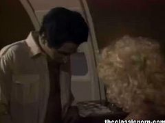 This sexy blonde meets the pilot during her flight. He is so eager to ram her hairy pussy, that he doesn't wait for the plain to land. She gives him head as well.