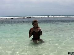 On hot sun shiny day voluptuous babe Kathia Nobili was bathing on the beach. Horny beauty was charmed by two brutal studs so she treated them with amazing double blowjob. Then babe got sandwiched like a cheap slut.