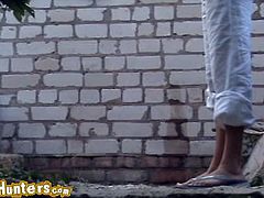 At this time one pretty girl came from bus stop. She's very fast and sharp. She quickly put down her pants, panties and squatted. The process of pissing took quietly. What she did not know was that we were filming the whole process. Enjoy!