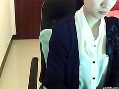 Tight and sexy Asian webcam lady takes off her jacket
