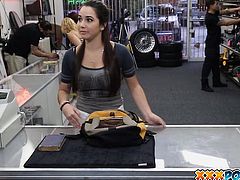 Sexy college girl flashes her tits in public in a pawn shop