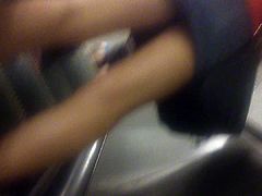 Girl in mini skirt upskirted on the escalator