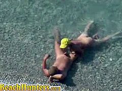 Spycam caught horny couples fucking at the beach