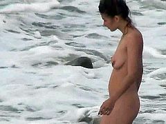 Lusty voyeur must have an amazing time spying on this nude beauty while at the beach