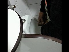 friend jerking off at urinal