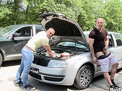 Sexy well-built homos Franc Zambo and Just Angelo are playing dirty games near a car. The dudes favour each other with blowjobs and bang in the side-by-side and other positions on the ground.