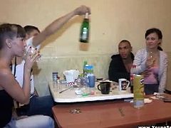 These brunette teens get together with a black and a white dude to party. After having some drinks, they end up in the bedroom, sucking and getting pounded.