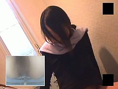 A voyeur has hidden a cam in this toilet. A Japanese girl comes in and starts masturbating while sitting on the toilet.