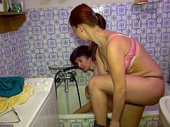 Granny and granddaughter bathe in the tub