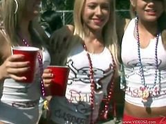 Watch these sexy ladies having a great time in an outdoors party where you'll get to see their sexy bodies are they have fun.