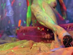 Lewd short haired chick Jinxy Laroue plays with her goodies covered in sticky fluorescent paint. Feel free to jerk off on Jinxy's jiggy shiny tits.