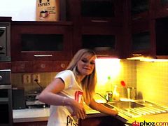 Mary is a blonde cutie who was surprised by a guy who showed up with his camera on while she was in the kitchen. She only had panties and a top on and teased him with her nice ass.