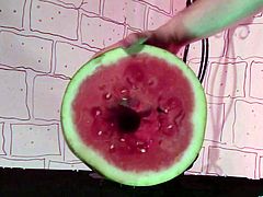 This horny dude with a nasty food fetish shoots a huge load of hot cum after screwing a watermelon as if it were a delicious pussy.