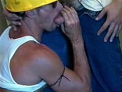 The gorgeous ripped construction workers get a little nasty and start sucking on their hard cocks with their sexy helmets on.
