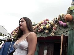 Have fun with this hot scene where this sexy brunette shows off her natural breasts out in public as you get a boner.