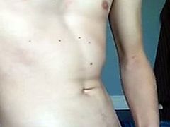 Young Asian twink strips and then shoots a big cum load over his body.