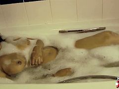 Rupali is an Indian amateur girl. Someone films her as she strips naked and gets in the bathtub. She washes herself, touching her pussy more than she should.