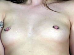 Jassie shows her pierced nipples and shaved coochie