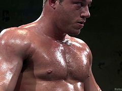 Big boys are wrestling hard today at Naked Kombat. They are mean, muscled and determined to win! Check them out, how hard they fight for supremacy, but only one will win and the other will bend over, or suck cock down on his knees. Stick around and enjoy more oily gay wrestling!