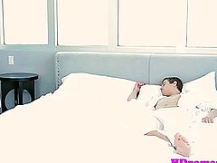 Passionate couple sweet love making in the bedroom