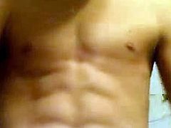Teenage twink boy with a perfect smooth body jerks his teen cock.