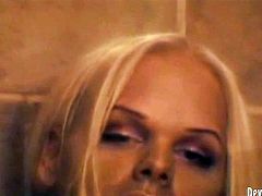 Ample brested blond shemale takes a shower and gives blowjob