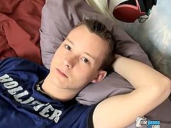 Young Ryan loves to show off his big feet while he strokes his cock for you
