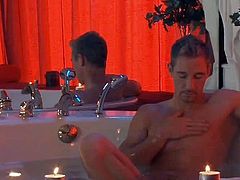 With all the candles and all that shit, these hot naked stud turns milking his long hard dick in the bathtub as he jerk and masturbate it for him to cum faster.