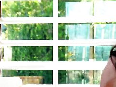 Michele Monroe with small tits and hairless twat poses seductively before masturbating
