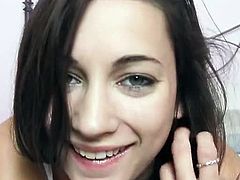 Pretty brunette Georgia Jones is home alone and starts locking in in her bedroom. She operates her webcam and records her stripteasing video for her boyfriend.