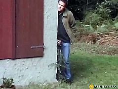 Blonde does blowjob peasant behind the garages