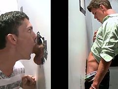 Breathtaking gay giving his partner stunning blowjob in close up view from a gloryhole