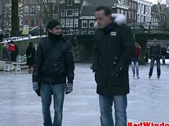 These guys were looking for hookers in Amsterdam. One of them found one that he liked. She sucked on his cock and stroke it until he came. He rimmed her afterwards.