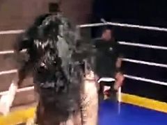 Bitch gives a head to a judge on squared ring