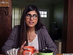 Mia Khalifa, the hottest pornstar today is ready to pop her cherry as she is together with this two black guys with two monster cocks  ramming deep into her filthy mouth and her delicious pussy.