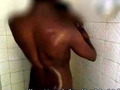 2 Horny Nigerian refresh each other bodies in a cheap hotel shower