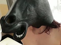 Playful brunette Kimberly Kane with natural boobs and bushy pussy displays her nice nude body before having fun. She inserts black dildo in her tight anal hole with her horse mask on. She does it for the camera eagerly. Kimberly Kane loves extreme sextoys!