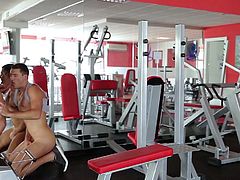 These muscular men are working their cores, and it gets them really horny. They want to fuck each other right there in the gym. One of the guys bends over and takes his lover's huge cock right into his asshole. It feels so good to have a massive dick in his ass!